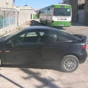 Продам Opel-tigra 1999 г.,  1.4,  черный металлик